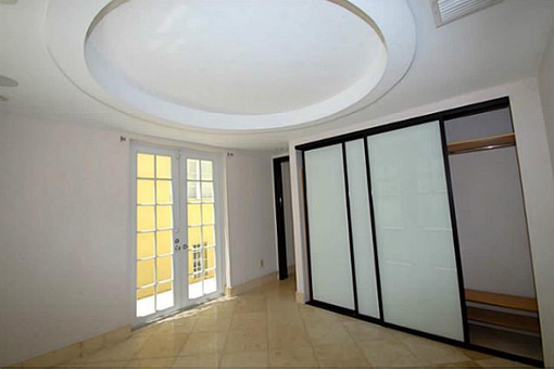 The first floor entrance with the ebonized cherry wood
