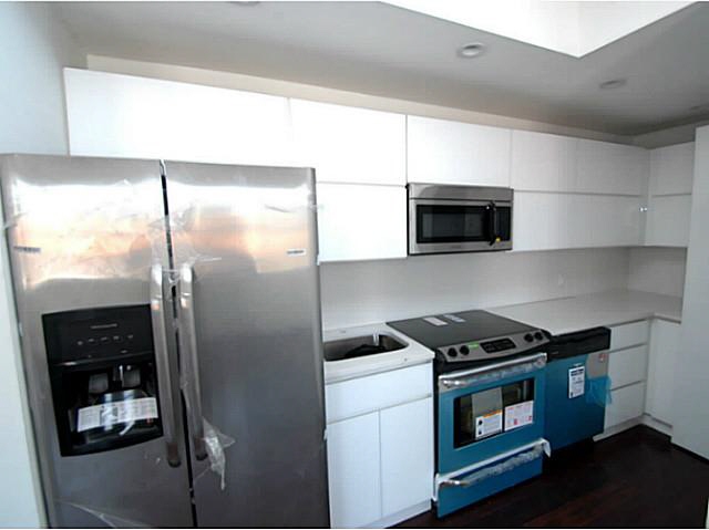 Totally renewed kitchen with stainless steel appliances