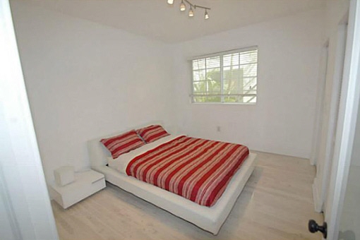 Commodious bedroom with big and comfortable bed