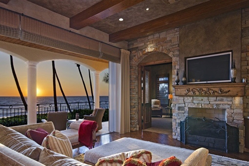 Living area with fireplace and view