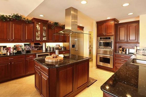 Fully equipped kitchen with wood cabinets in Fort Myers