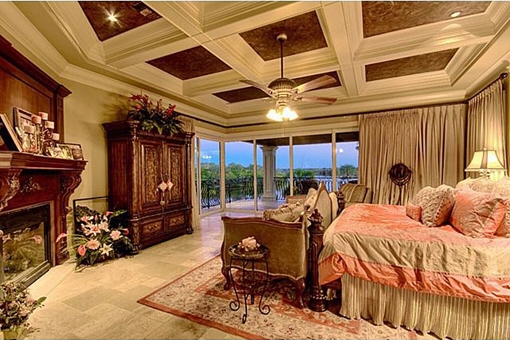 One of the master bedroom with a fireplace 