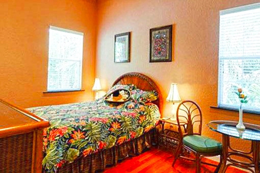 Cozy bedroom with the double bed