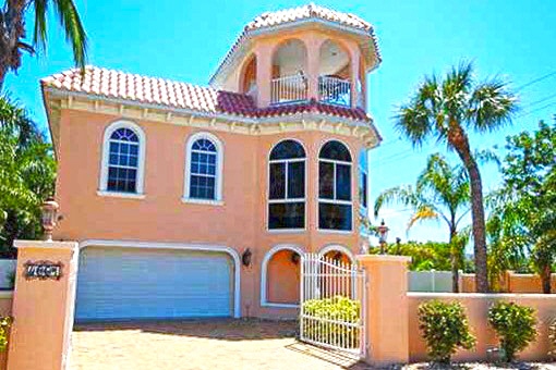 The beautiful house with the pool and an oversized garage